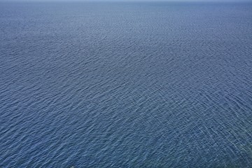 Shallow waves on the blue ocean surface