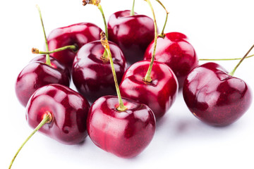 Close-up fresh cherries fruit isolated on white background