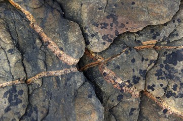 Adern in rosafarbenen Granit