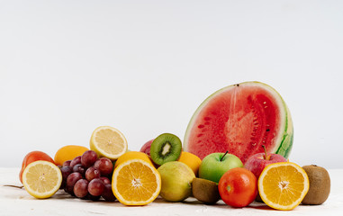 variety of organic fruits on a white background