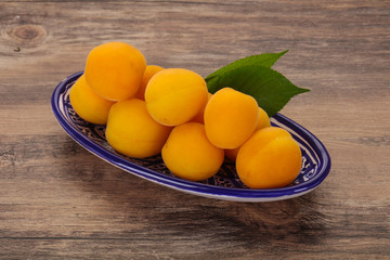 Ripe tasty sweet apricots heap