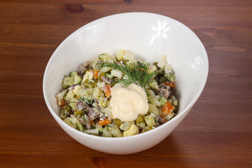 Traditional Russian salad with meat