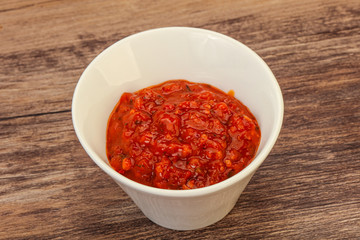Tomato spicy sauce in the bowl