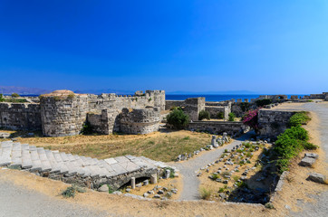 Neratzia Castle,Sculpture-strewn, 14th-century ruins of a seaside fortress featuring panoramic vistas of Kos harbor.Kos, Greece