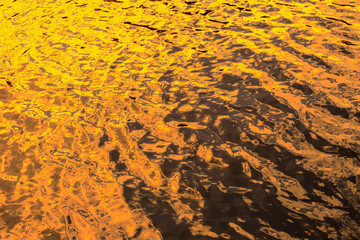 Background orange water surface.