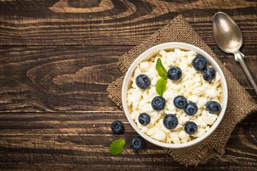 Curd or cottage cheese in white plate.