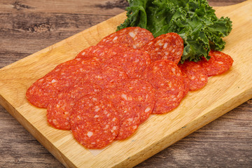 Italian spycy pepperoni sausage slices
