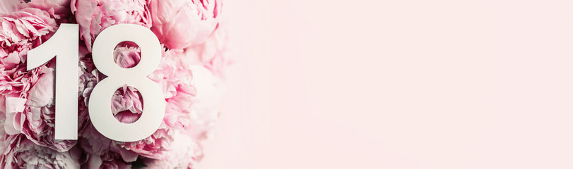 Creative layout. Peony flowers, digit eighteen. Birthday greeting card with inscription 18....