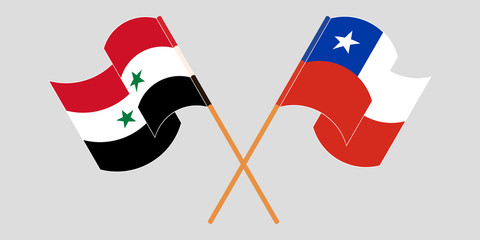 Naklejka premium Crossed and waving flags of Syria and Chile