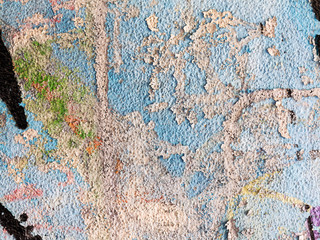 Background concrete wall, traces of weathering, worn wall damaged paint old paint. Remains of old paint on the painted concrete surface. Grungy concrete surface.