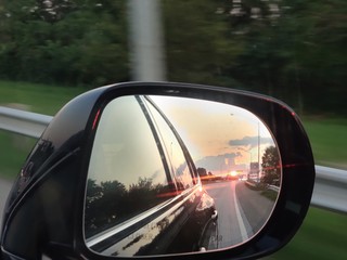 travel rearview mirror leaving vacation bridge driving road cars