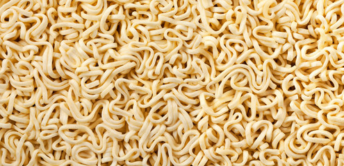 Background and texture of instant noodles. Panorama.