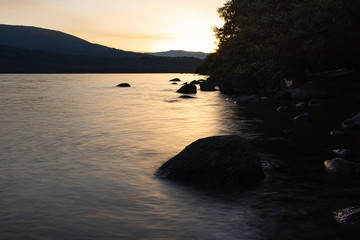 Astonishing sunrise between the mountains with the famous Sanabria lake in the background, Spain