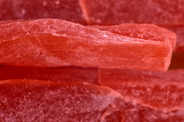 Dried papaya slices background, close up, copy space