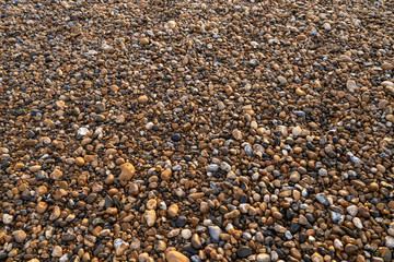Multi coloured pebbles on the beach