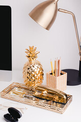 Gold desktop office pineapple and accessories