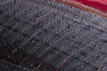 Water drops on the rear window of the car