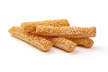 Puff pastry cookies with sesame seeds, isolated on white background.