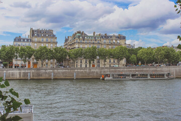 Naklejka premium embankment along the Seine river, panoramic view of Paris
