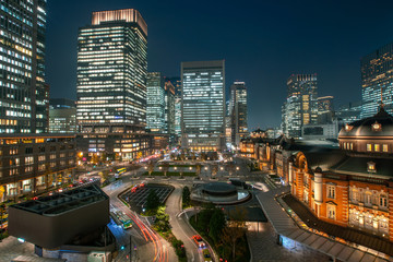 Tokyo, Japan at the Marunouchi business district and Tokyo Station.