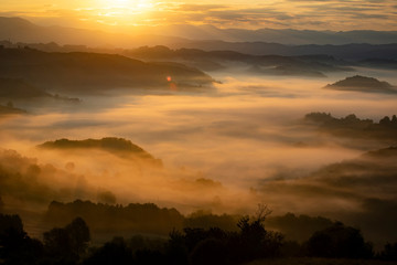 Magic sunrise in a Carpathian mountain valley