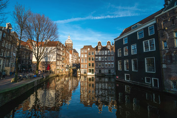 Obraz premium Amsterdam canal in sunny day, Amsterdam is the capital and most populous city in Netherlands. Amsterdam is the capital and most populous city in Netherlands.