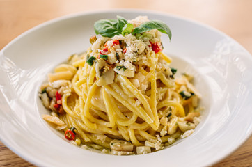Naklejka na ściany i meble Spaghetti aglio olio e peperoncino. Italian vegetable pasta.