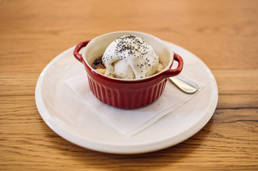 Sweet dessert with icecream in a red cup