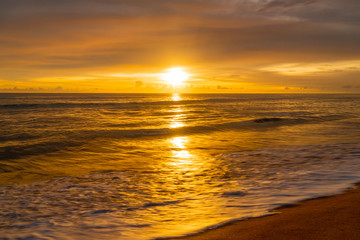 Naklejka na ściany i meble Beautiful sunset on the beach and sea - Vintage Filter
