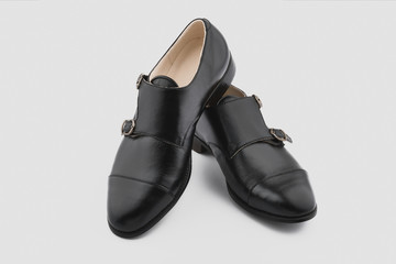 Male classic shoes. Elegant black monk shoes