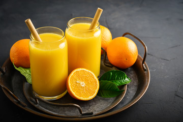 Fototapeta na wymiar Two Glasses of Fresh Orange Juice
