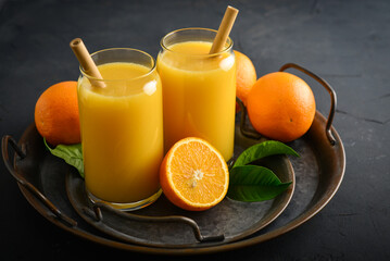 Fototapeta na wymiar Two Glasses of Fresh Orange Juice
