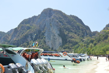 Sea Rocks around blue sea in phi phi island