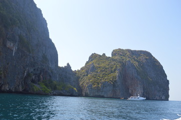 Sea Rocks around blue sea in phi phi island