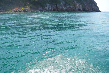 Sea Rocks around blue sea in phi phi island