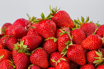 Ripe strawberries ready for eating in wooden boxes. Red ripe strawberries closeup. Selective focus. You can use as the background for any of Your project.