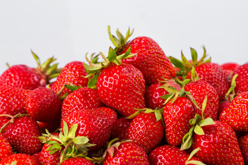 Ripe strawberries ready for eating in wooden boxes. Red ripe strawberries closeup. Selective focus. You can use as the background for any of Your project.