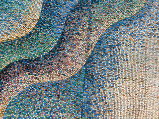 Detail of beautiful old collapsing abstract ceramic mosaic adorned building. Venetian mosaic as decorative background. Selective focus. Abstract Pattern. Abstract mosaic colored ceramic stones