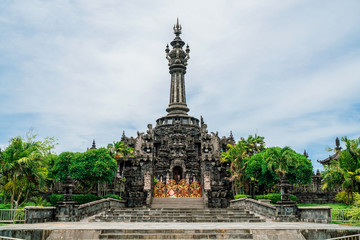Fototapeta na wymiar Entrance to the Bajra Sandhi Monument in the center of Denpasar Bali. A popular landmark in the center of Denpasar. The 45 meter high monument is a symbol of the Balinese struggle for independence