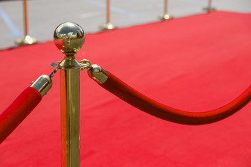 Way to success on the red carpet (Barrier rope). Selective focus