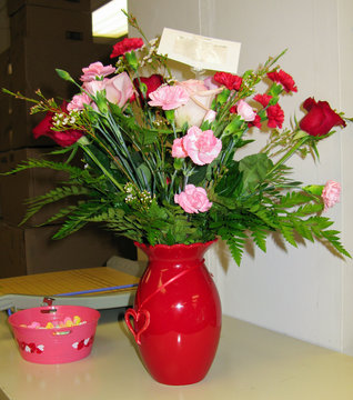 a bouquet of flowers just in time to valentime's day at an office setting