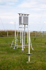 Weather meter with sea background. Weather station on the coast of the Black sea in a summer Sunny...