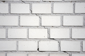 White brick wall background. Abstract weathered textured white brick wall background