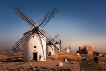 Windmills and castle of Consuegra, the famous giants from "El Quijote" novel.