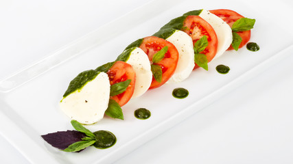 Delicious gourmet food on the table. Gourmet cuisine in white dish. Creative restaurant concept.