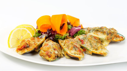 Delicious gourmet food on the table. Gourmet cuisine in white dish. Creative restaurant concept.