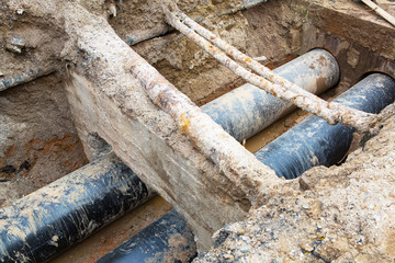 Pipes and cables. Repair of communications. Water supply, electricity, Sewerage. Excavated roads in the city.