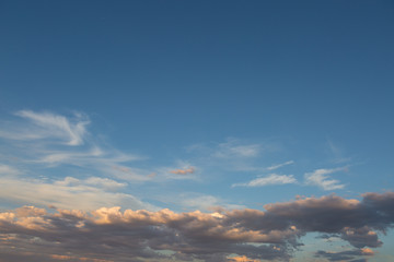 Fototapeta premium Beautiful atmospheric dramatic clouds in the evening at sunset.
