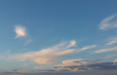 Fototapeta na wymiar Beautiful atmospheric dramatic clouds in the evening at sunset.