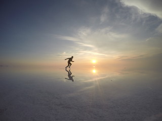Obraz na płótnie Canvas silhouette of a man jumping